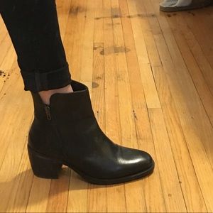 Black leather heeled boots